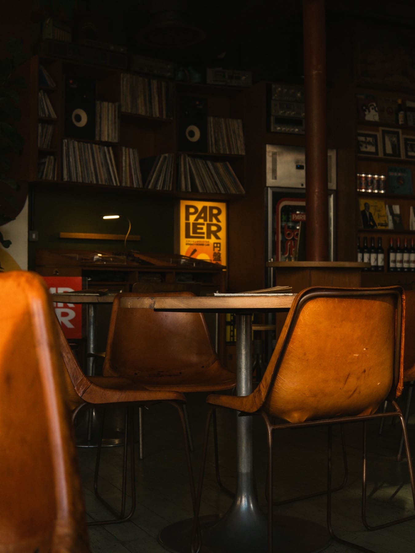 Parler bar chair and logo in the back