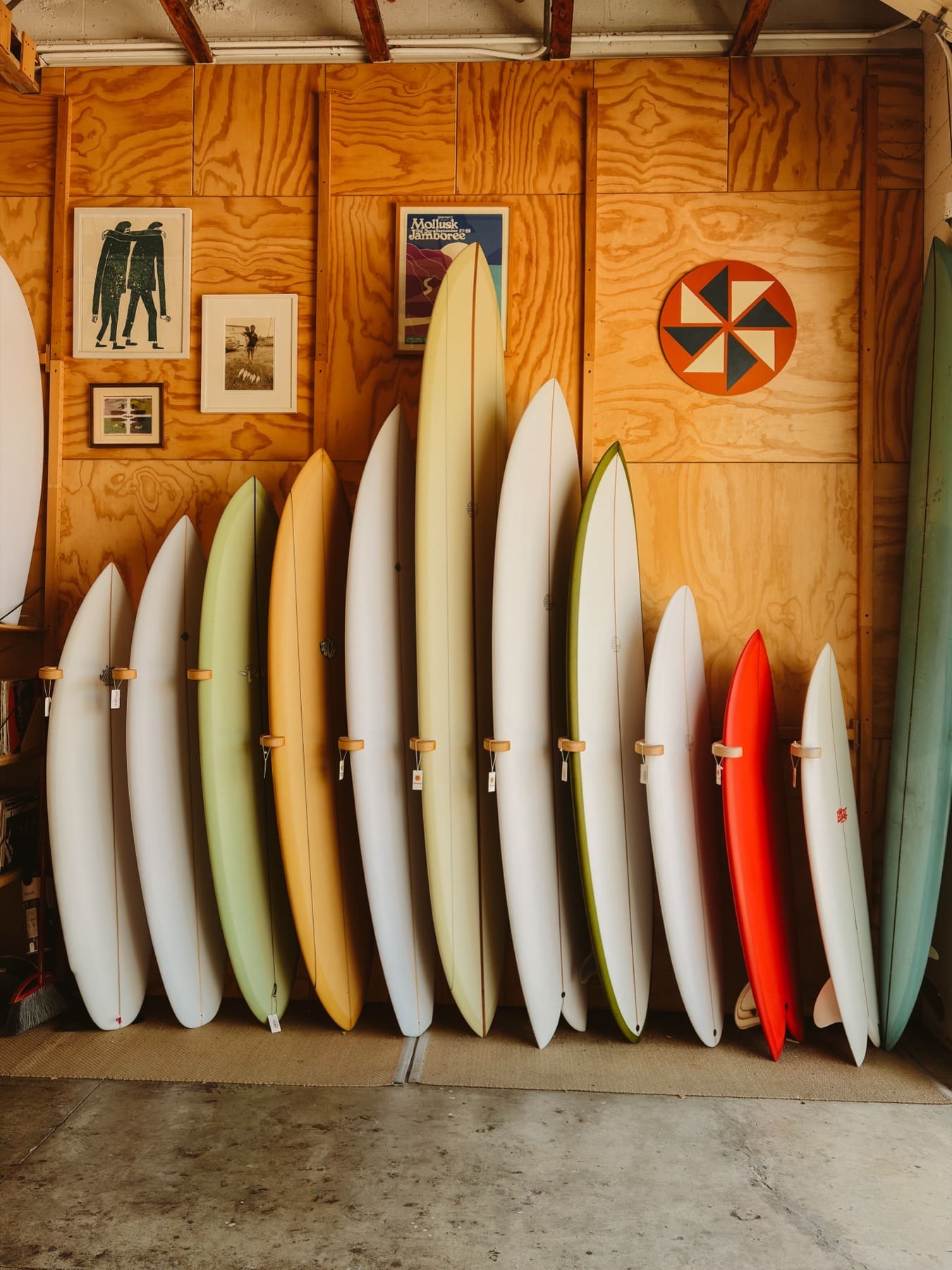 A view of a full surfboard rack in a surf shop