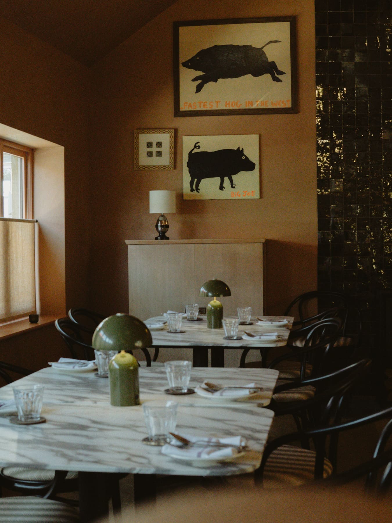 Lardon restaurant table with cutlery visible