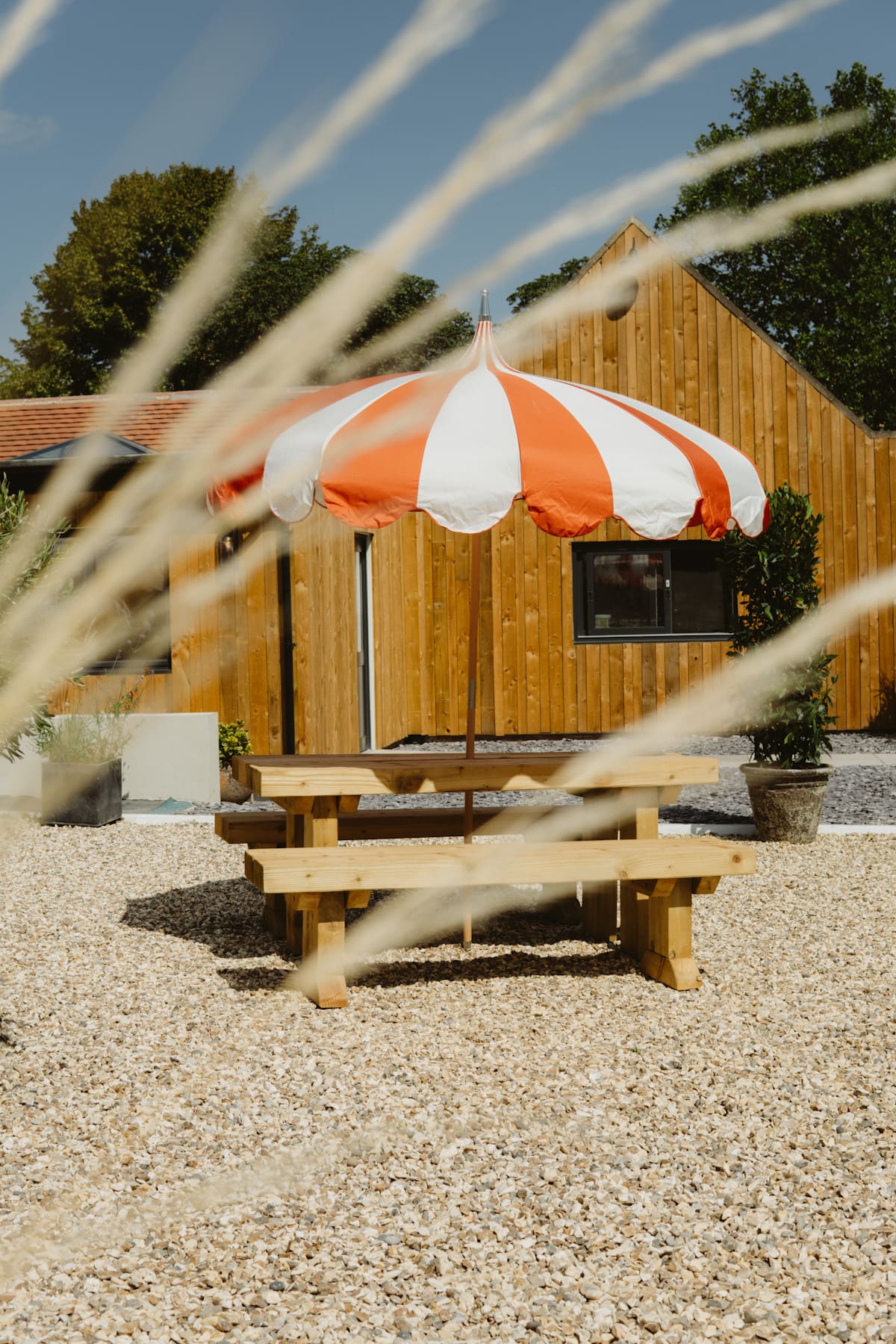 A white and orange striped parasol